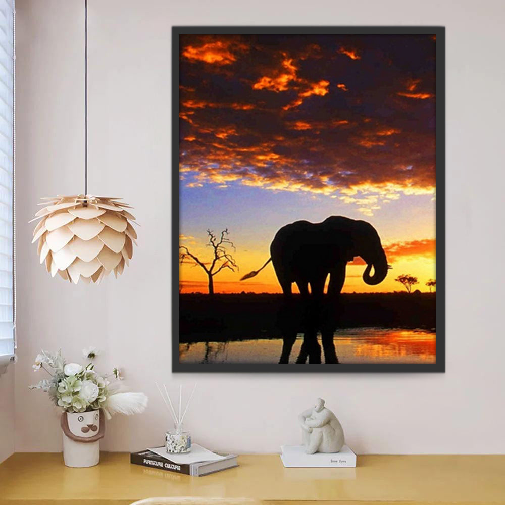Profil d'Éléphant et Nuages Rouges Peinture par Numéros